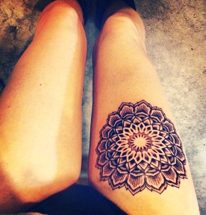 Black And Grey Mandala Flower Tattoo On Girl Right Thigh