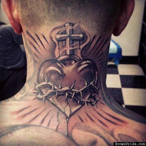 Black And Grey Sacred Heart With Barbed Tattoo On Man Back Neck