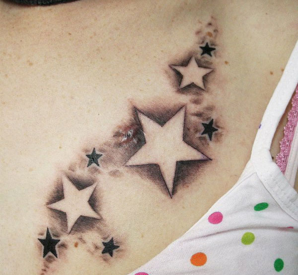 Black And Grey Star Tattoos On Collarbone