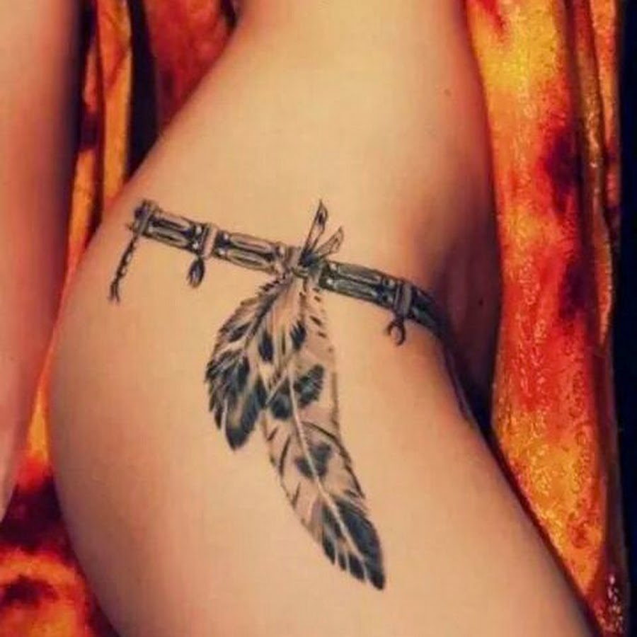 Black And Grey Two Feather Tattoo On Girl Side Hip
