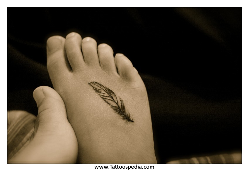 Black Feather Tattoo On Foot