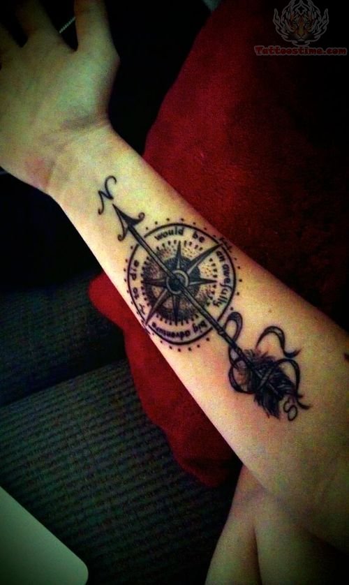 Black Ink Arrow In Compass Tattoo On Forearm