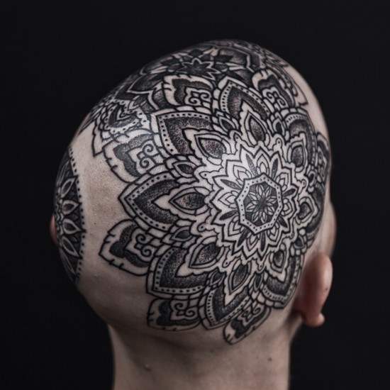Black Ink Mandala Design Tattoo On Man Head