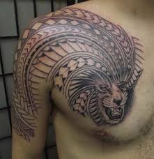 Black Ink Polynesian Lion Face Tattoo On Man Chest