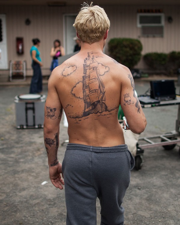 Black Ink Ship Tattoo On Man Full Back