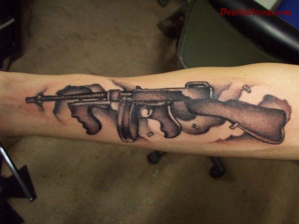 Black Ink Tommy Gun Tattoo Design For Forearm