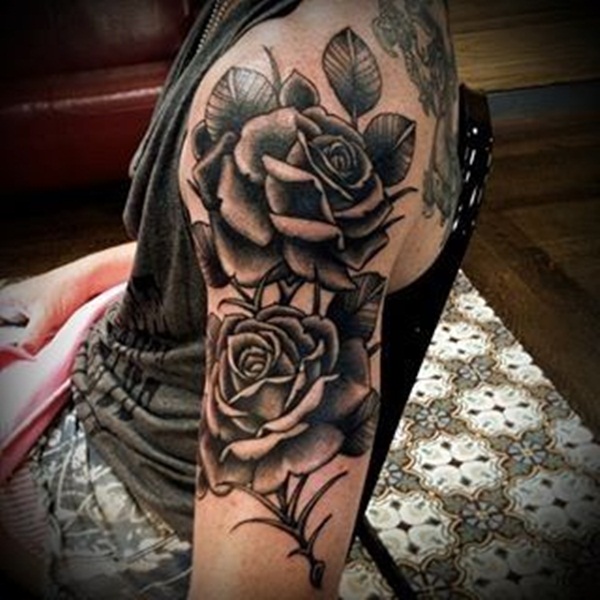 Black Ink Two Roses Tattoo On Left Arm