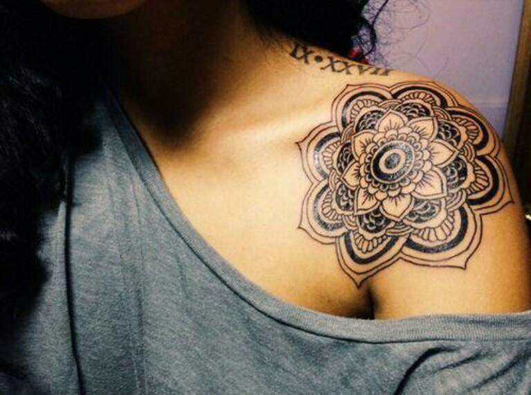 Black Mandala Design Tattoo On Girl Left Front Shoulder