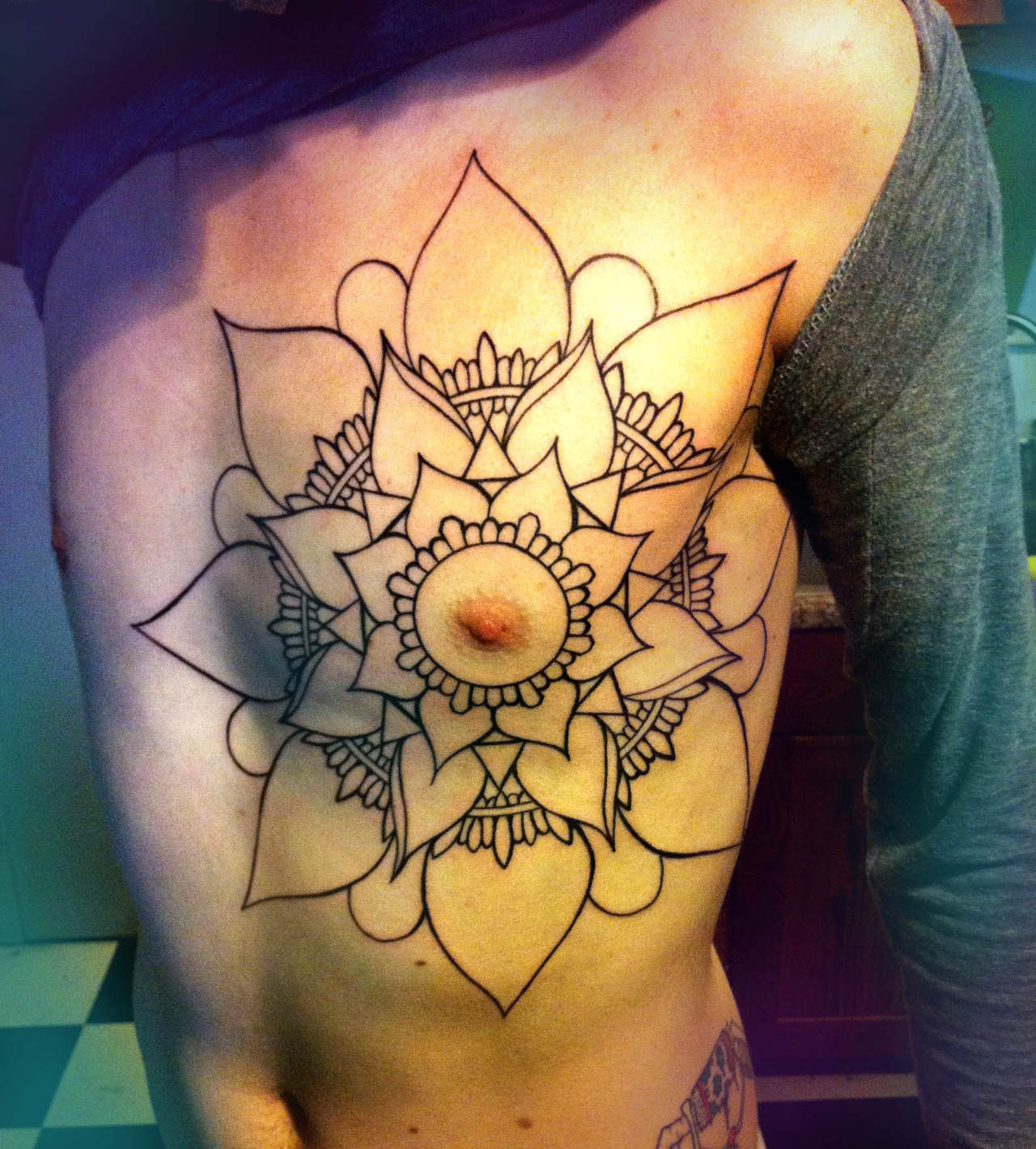Black Mandala Flower Tattoo On Man Chest