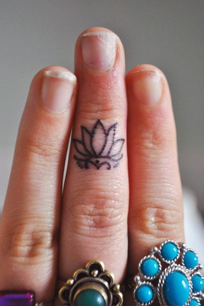 Black Outline Lotus Flower Tattoo On Finger
