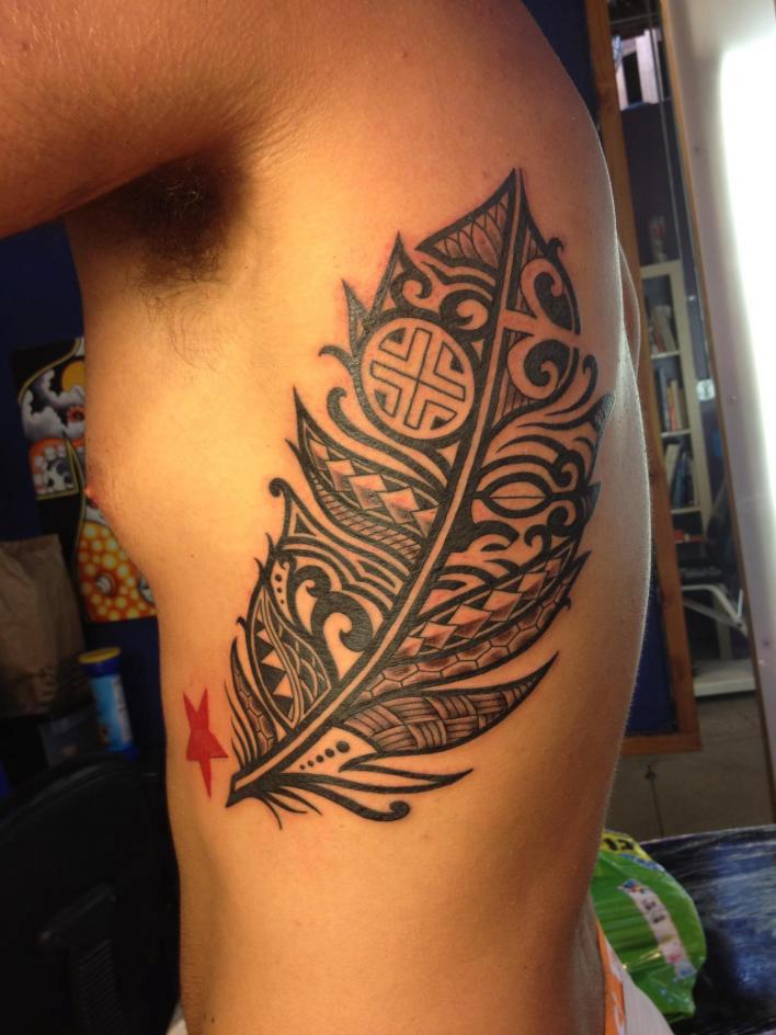 Black Polynesian Feather Tattoo On Upper Side Rib