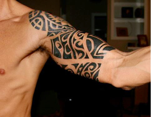 Black Tribal Bicep Tattoo On Man Left Bicep