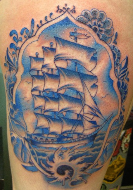 Blue Ink Ship In Frame Tattoo Design