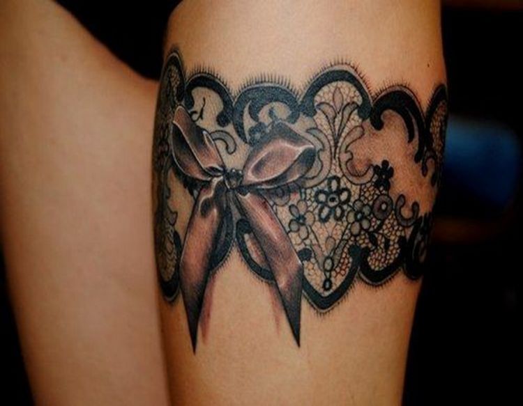 Bow And Lace Tattoo On Leg