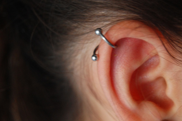 Cartilage Piercing With Spiral Ear Ring