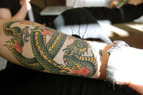 Colorful Dragon Tattoo On Forearm