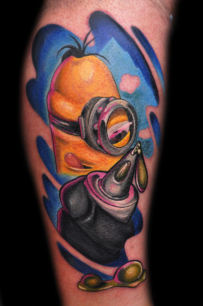 Colorful Ripped Skin Minion Tattoo Design By Bobby Leach