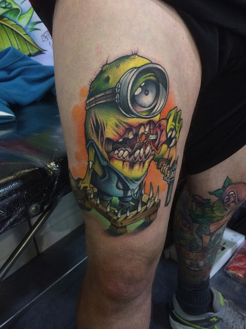 Colorful Zombie Minion Tattoo On Thigh
