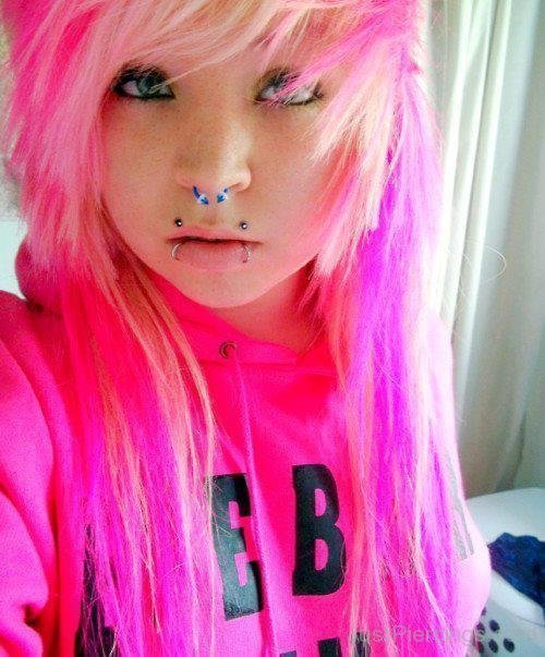 Emo Girl With Septum Piercing And Canine Bites Piercing