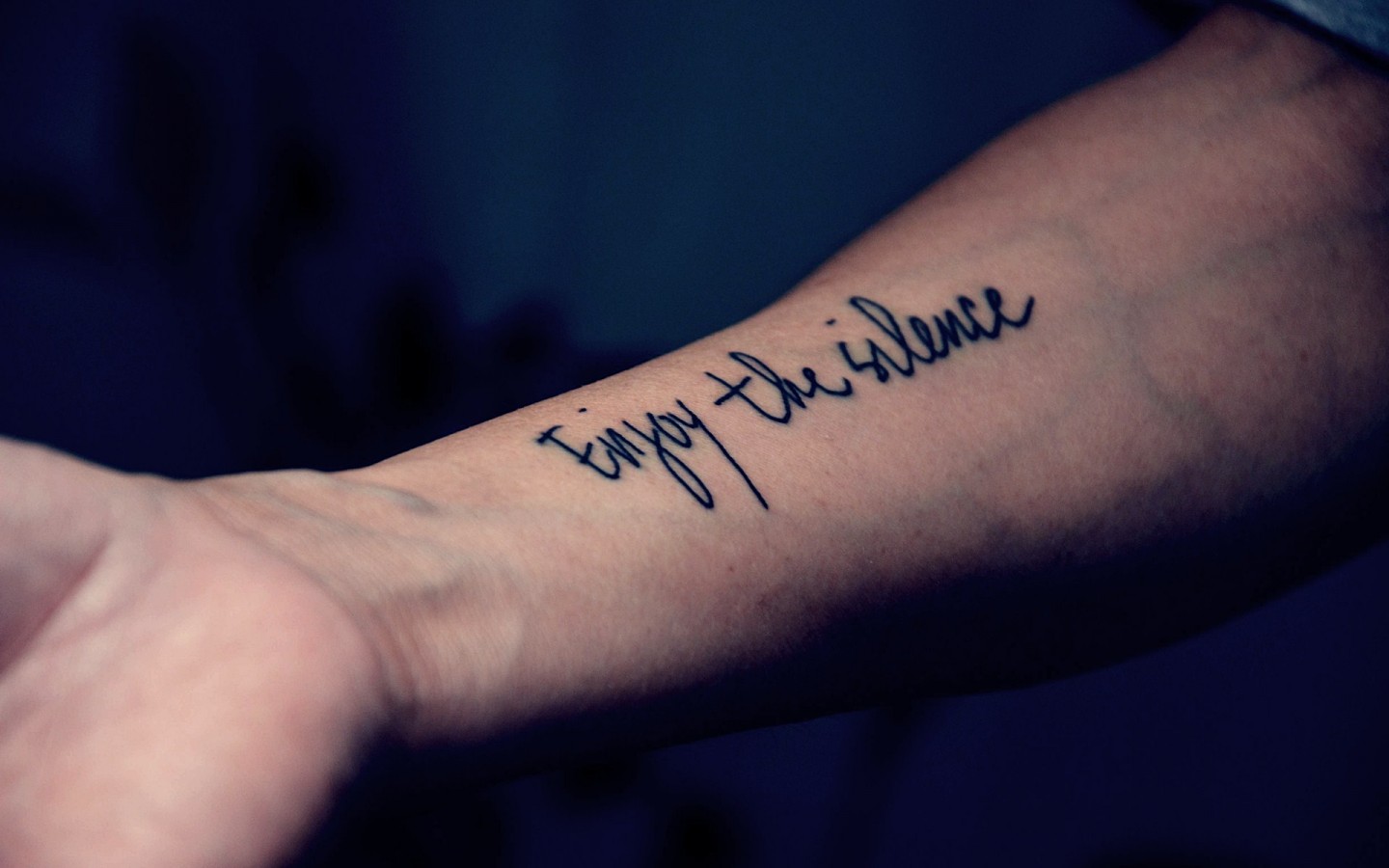 Enjoy The Silence Lettering Tattoo On Forearm
