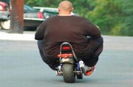 Fatty-Man-Riding-Tiny-Bike-Funny-Image.j
