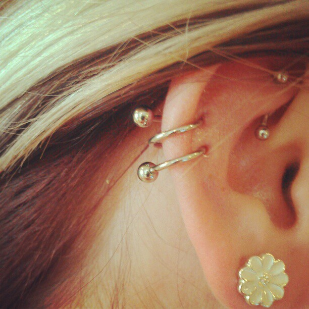 Flower Stud Ear Lobe And Spiral Piercing Picture