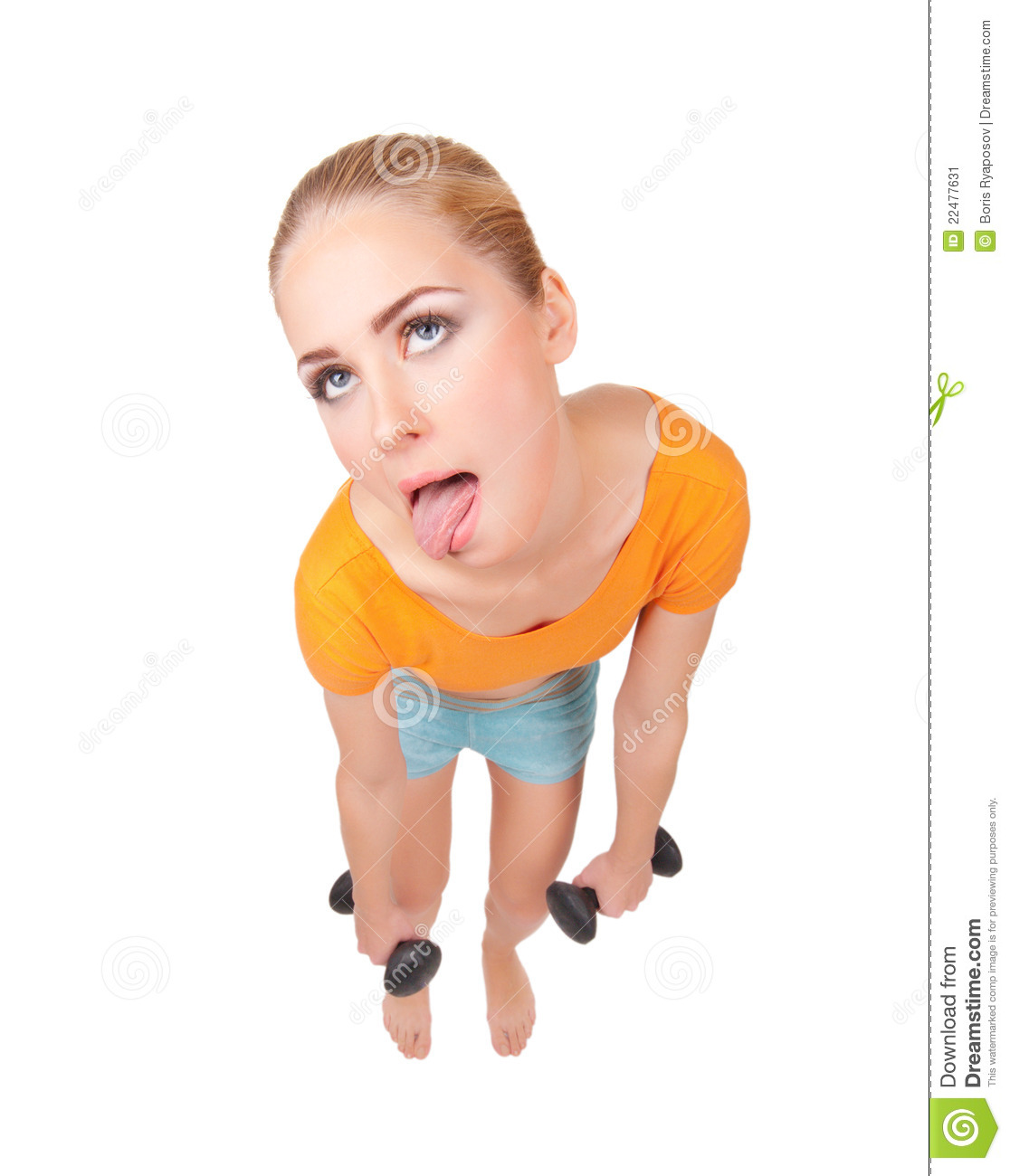 Funny Young Woman With Dumbbells And Showing Tongue