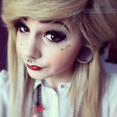 Girl With Septum And Teardrop Piercing