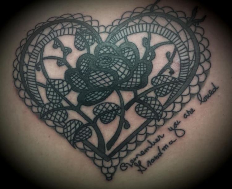 Grey Ink Heart Lace Tattoo Design Idea