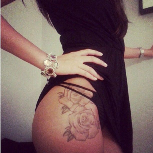 Grey Ink Two Roses Tattoo On Girl Side Hip