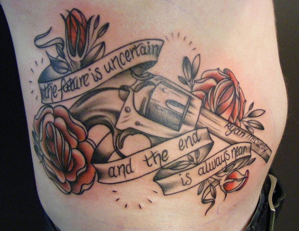 Gun With Roses And Banner Tattoo On Side Rib