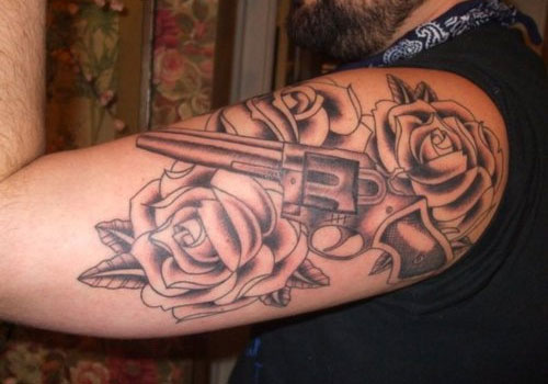 Gun With Three Roses Tattoo On Half Sleeve