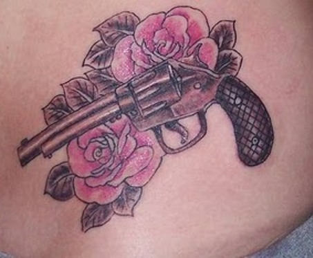 Gun With Two Pink Roses Tattoo Design