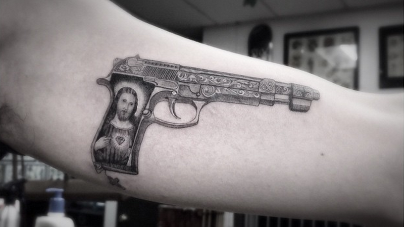 Jesus In Gun Tattoo Design For Sleeve