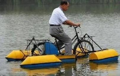 Man Riding Funny Boat Bicycle