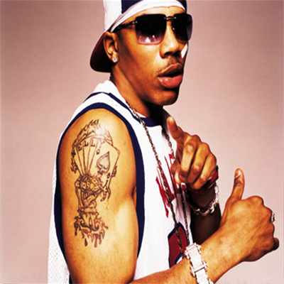 Nelly With Bicep Tattoo On Half Sleeve