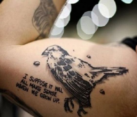 Quote And Sparrow Tattoo On Inner Bicep