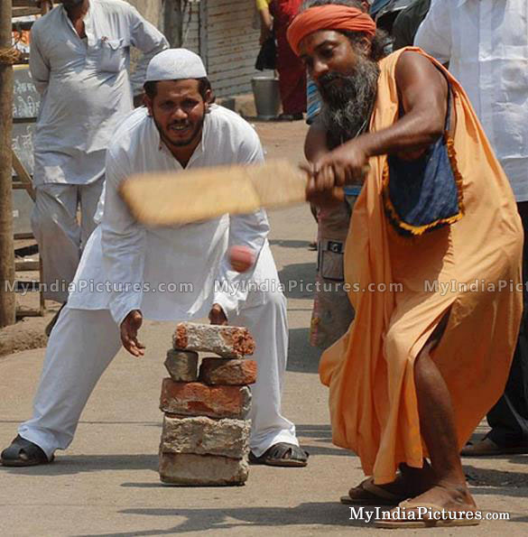 Religious Man Playing Cricket Funny Picture