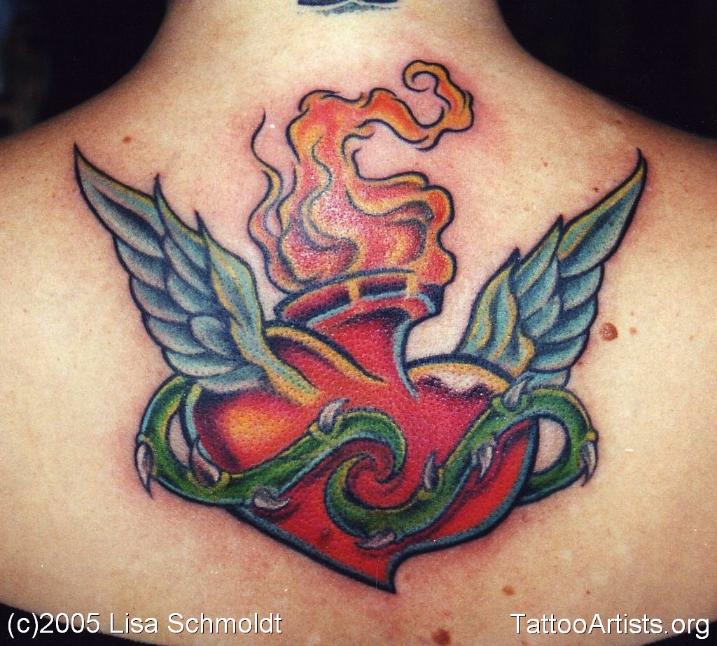 Sacred Heart With Wings Tattoo On Upper Back