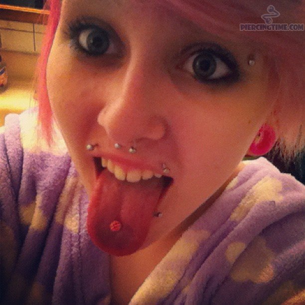 Septum, Tongue And Canine Bites Piercing For Girls