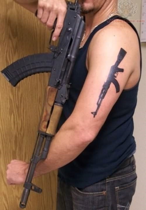Silhouette Ak 47 Gun Tattoo On Man Left Half Sleeve