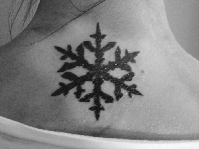 Silhouette Snowflake Tattoo On Upper Back By Maria Ronngren