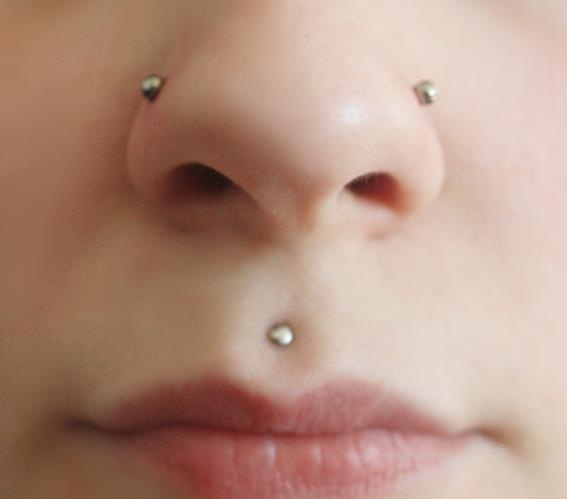 Silver Studs Nose Piercing And Philtrum Piercings