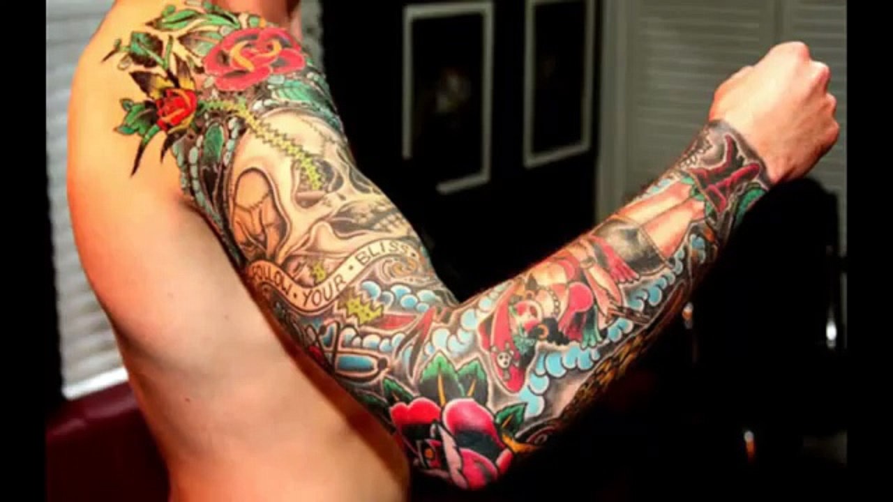 Skull With Colorful Flowers And Banner Tattoo On Right Full Arm