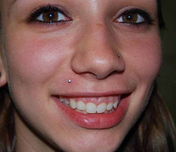 Smiling Girl With Madonna Piercing