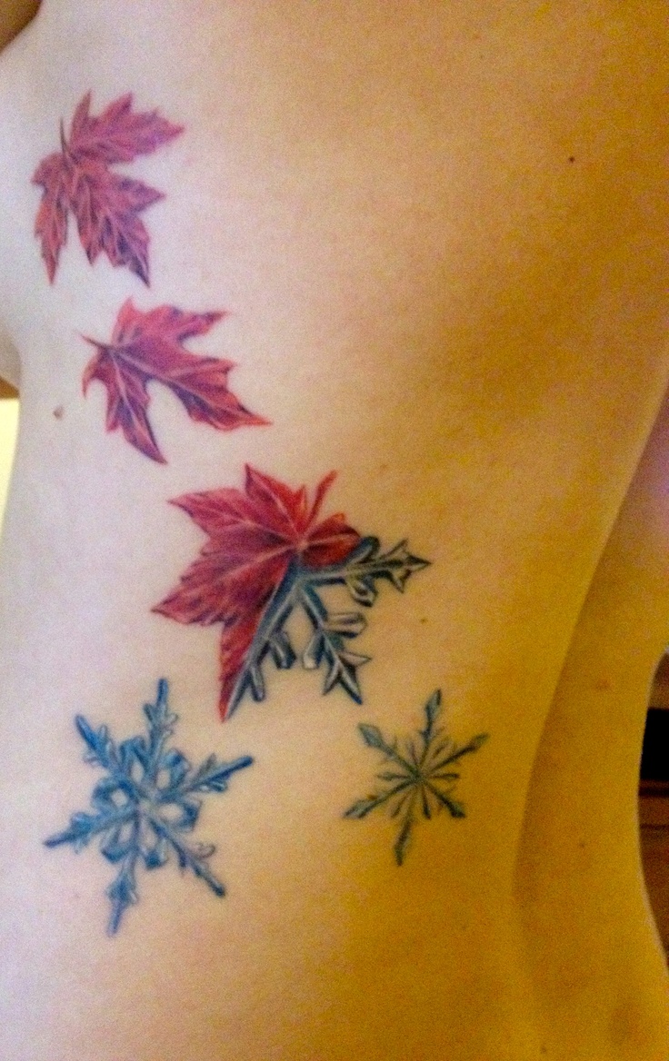 Snowflakes With Maple Leafs Tattoo On Side Rib