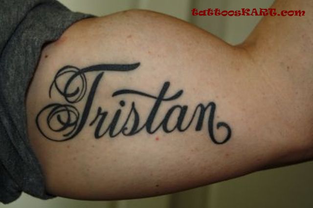 Tristan Wording Tattoo On Bicep