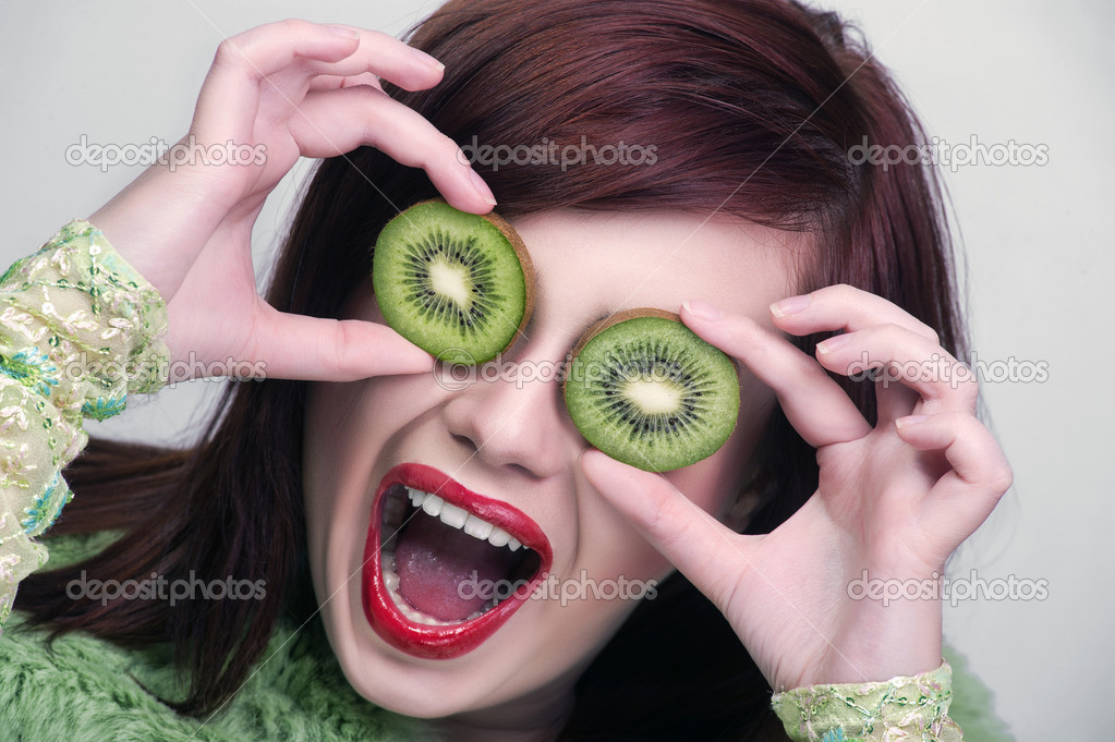 Woman Hide Her Eyes With Kiwi Funny Picture