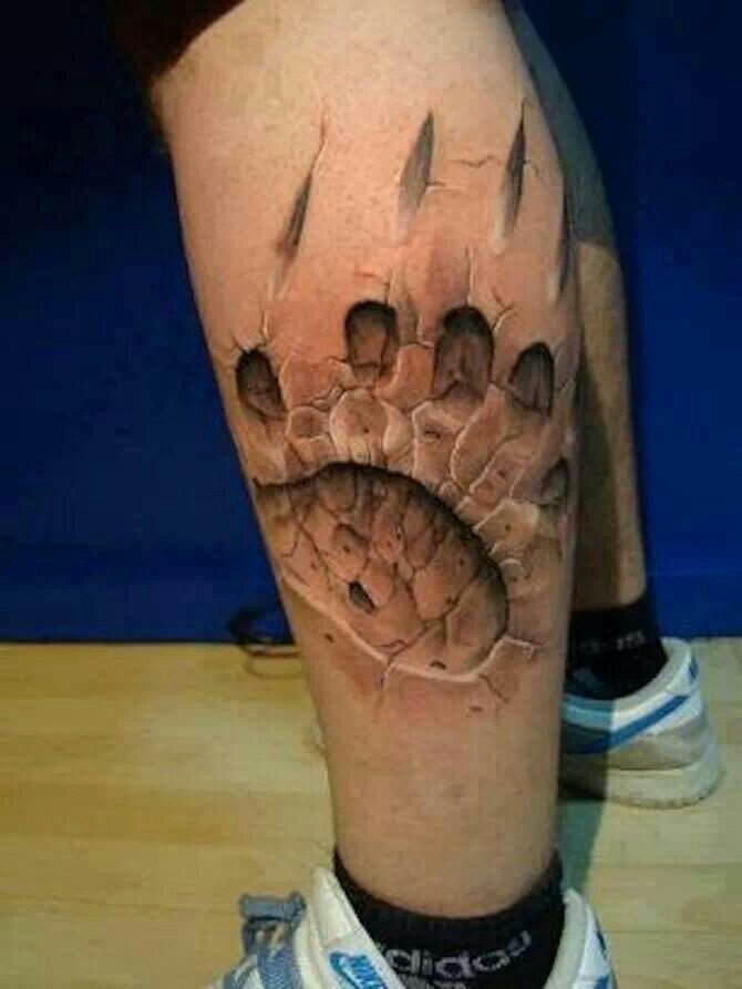 Amazing 3D Bobcat Paw Print Tattoo On Leg