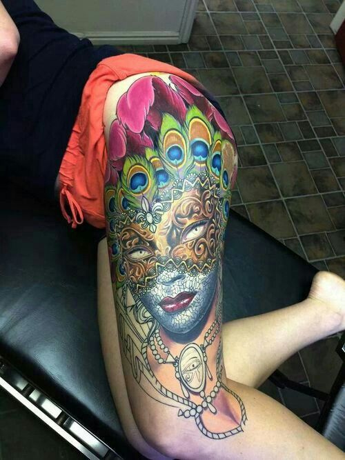 Amazing Colorful Mardi Gras Girl Face Tattoo On Girl Thigh